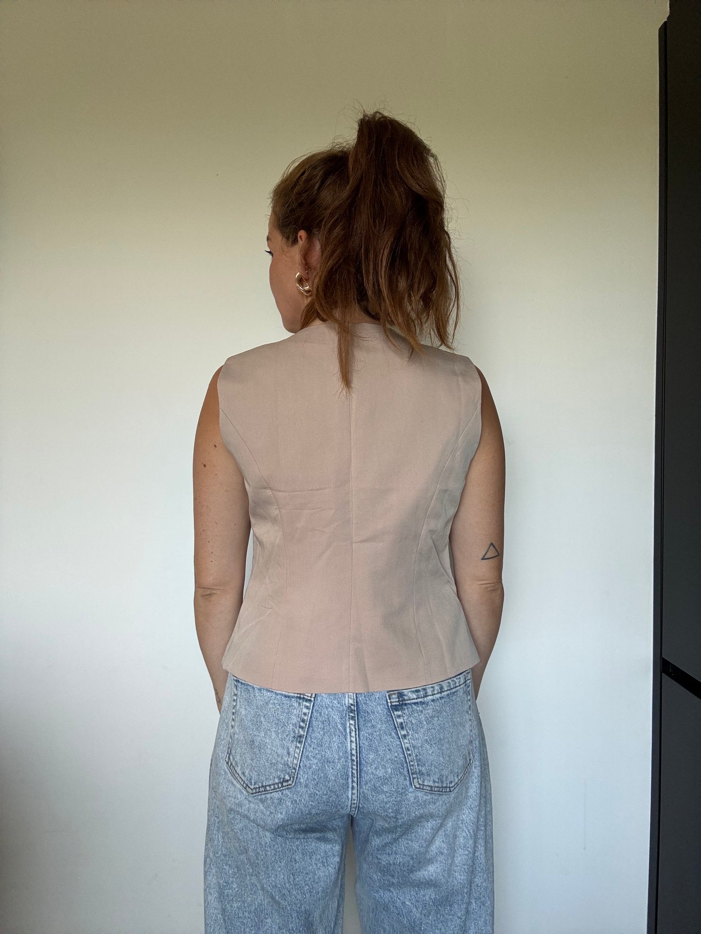 Beige gilet met knopen
