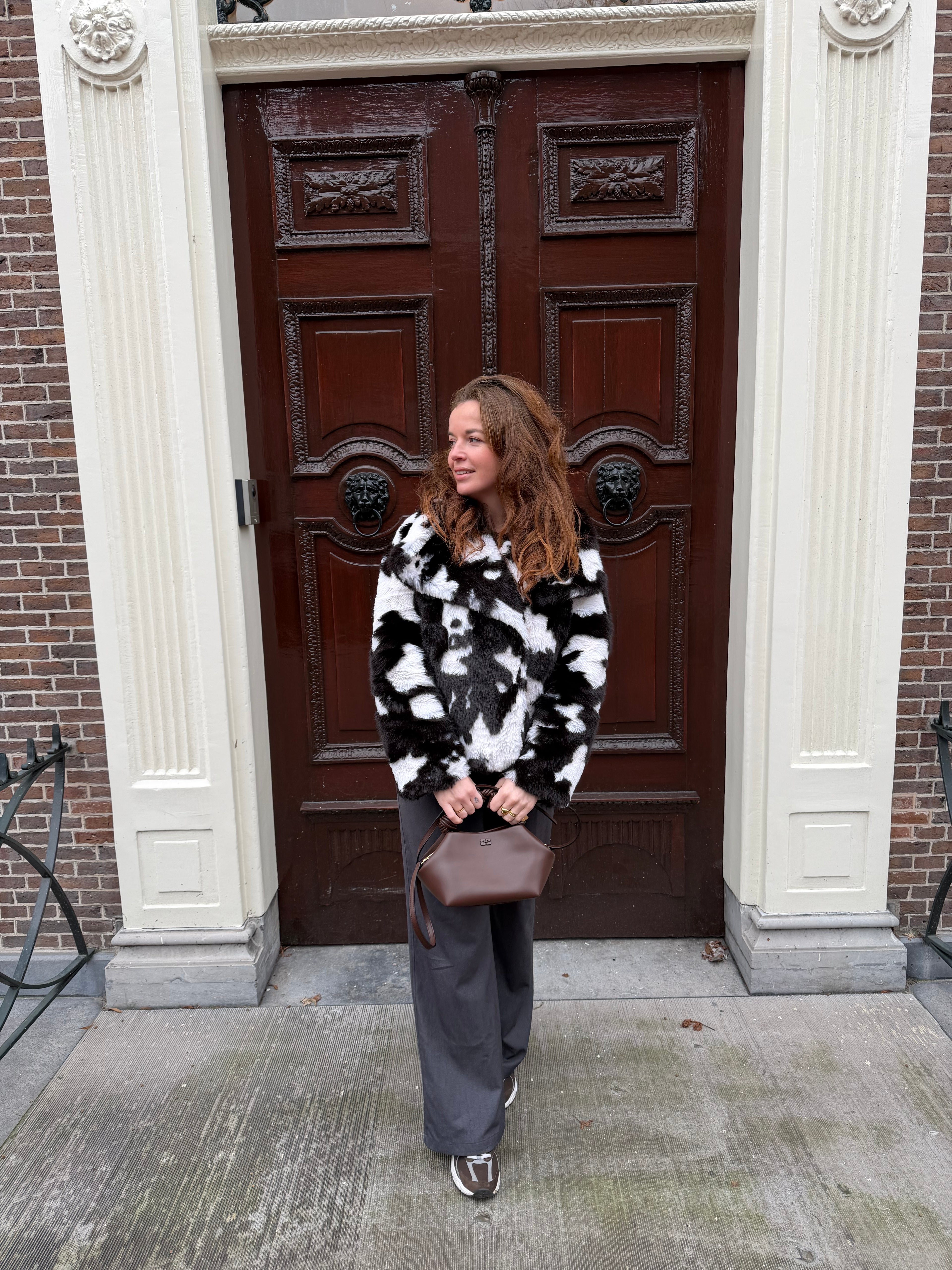 Fluffy koeienprint jas