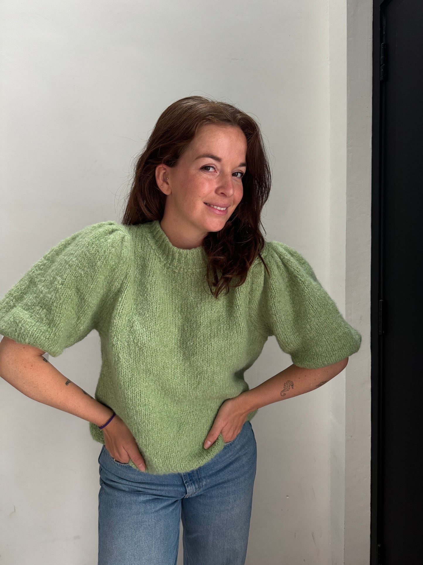 Groene top met pofmouwen